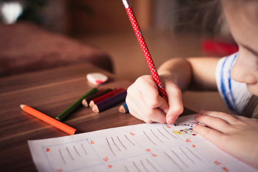 Children Learn About Monarch Butterflies While Coloring Printed Pages